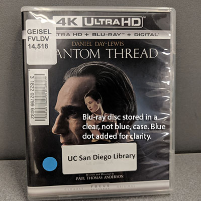 Image showing Blu-ray disc stored in clear case, with blue dot indicating it's a Blu-ray disc